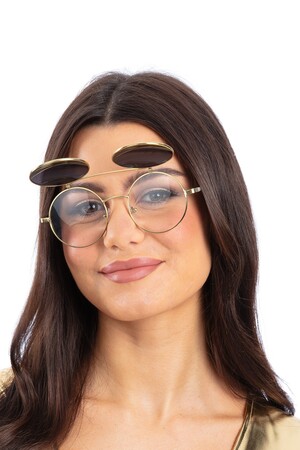 Очила Кръгли-златни, Куку МагЪзин